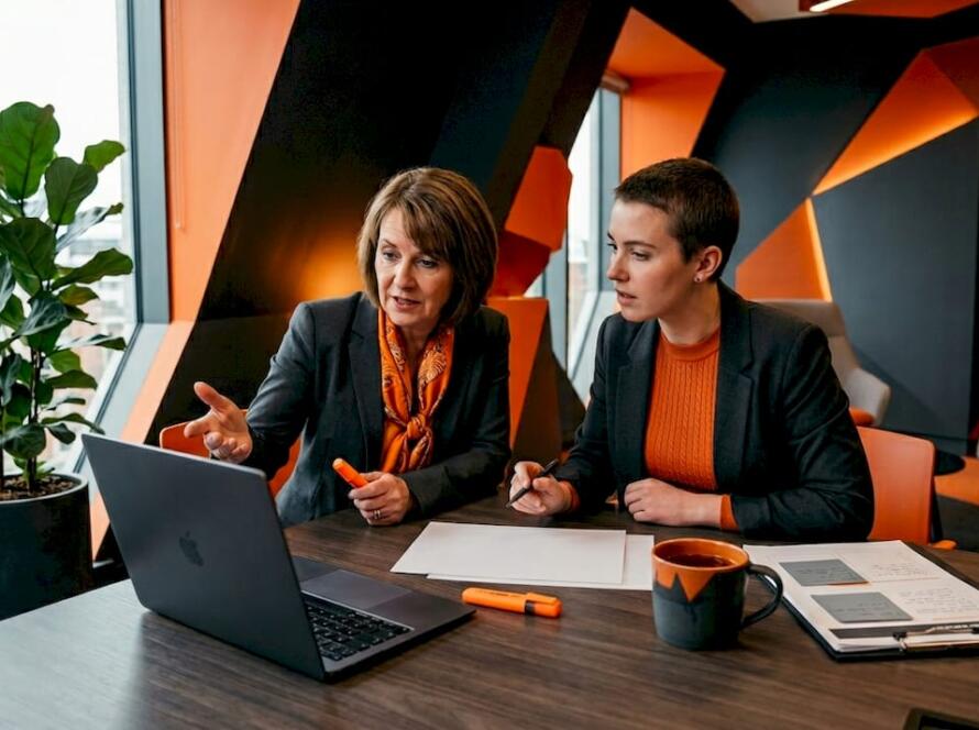 Care home manager and consultant reviewing website
